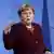 German Chancellor Angela Merkel speaks during a press conference in Berlin on Friday