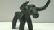 An ancient bronze bull figurine that was found in ancient Olympia. An ancient bronze bull figurine that was found in ancient Olympia.