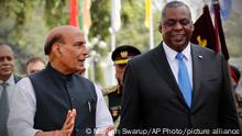 Indian Defense Minister Rajnath Singh walks with U.S. Defense Secretary Lloyd Austin as the latter arrives for a Guard of Honor ceremony in New Delhi, India, Saturday, March 20, 2021. Secretary of State Antony Blinken and Austin are on the first overseas trip by Cabinet-level officials since President Joe Biden took office. They visited Japan and Seoul, after which Austin travelled on to New Delhi for talks with Indian officials. (AP Photo/Manish Swarup)