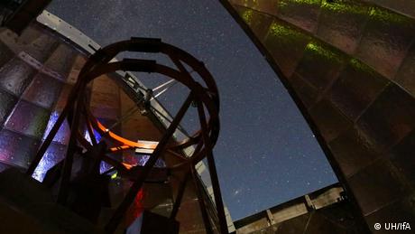 This photo shows the view from inside the dome of NASA’s Infrared Telescope Facility during a night of observing. The 3.2-meter (10.5-foot) telescope atop Hawaii’s Mauna Kea will be used to measure the infrared spectrum of asteroid 2001 FO32.
