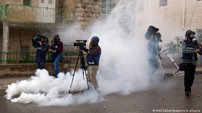 Which side are you on? Reporting on clashes between Palestinians and Israeli soldiers in the West Bank.