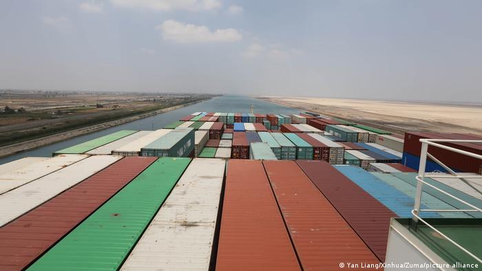 A freight ship goes through the Suez Canal