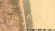 24/03/2021 This satellite image from Planet Labs Inc. shows the cargo ship MV Ever Given stuck in the Suez Canal near Suez, Egypt, Tuesday, March 23, 2021. A cargo container ship that's among the largest in the world has turned sideways and blocked all traffic in Egypt's Suez Canal, officials said Wednesday, March 24, 2021, threatening to disrupt a global shipping system already strained by the coronavirus pandemic. (Planet Labs Inc. via AP)