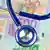 A stethoscope in front of euro bills