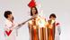 The Olympic torch is lit by a member of Japan's women's national soccer team in Naraha, Japan The Olympic torch is lit by a member of Japan's women's national soccer team in Naraha, Japan