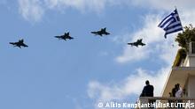 Hellenic Air Force fighter jets fly over Athens during a military parade marking the 200th anniversary of the Greek War of Independence, Greece March 25, 2021. REUTERS/Alkis Konstantinidis