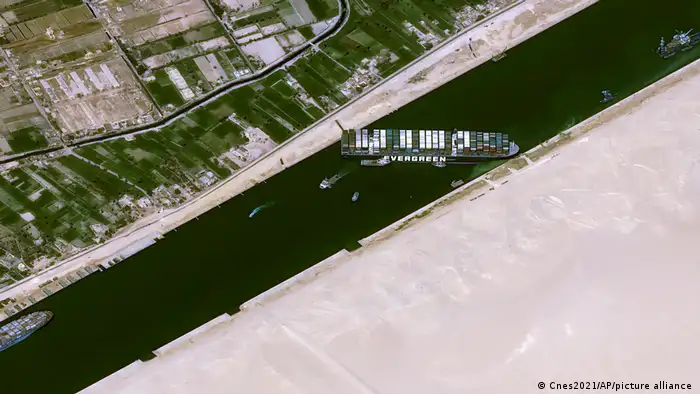An aerial view of the freighter ship Ever Given lodged in the Suez Canal