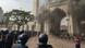 A cloud of smoke appears as police disperses protests. A cloud of smoke appears as police disperses protests.