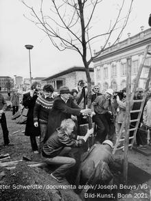 Joseph Beuys planting trees with his team
