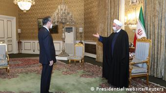 Iran Präsident Hassan Rouhani und Wang Yi Außenminister China