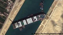 Ever Given container ship is pictured in Suez Canal, in Suez Canal in this Maxar Technologies satellite image taken on March 27, 2021. Satellite image ©2021 Maxar Technologies/Handout via REUTERS ATTENTION EDITORS - THIS IMAGE HAS BEEN SUPPLIED BY A THIRD PARTY. MANDATORY CREDIT. NO RESALES. NO ARCHIVES. DO NOT OBSCURE LOGO.