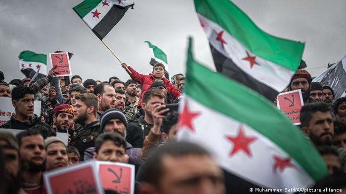 Syrians stage a demonstration against leader Bashar al-Assad's regime