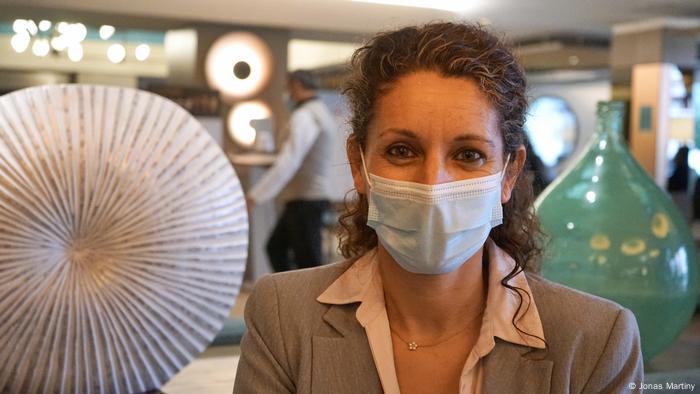 Hotel director Tina Ferrer wearing a surgical face mask Hotel director Tina Ferrer wearing a surgical face mask