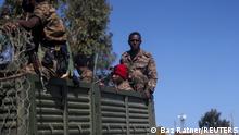 Ethiopian soldiers ride on a truck near the town of Adigrat, Tigray region, Ethiopia, March 18, 2021. REUTERS/Baz Ratner SEARCH RATNER TIGRAY FOR THIS STORY. SEARCH WIDER IMAGE FOR ALL STORIES