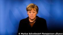 German Chancellor Angela Merkel briefs the media after a virtual meeting with federal state governors at the chancellery in Berlin, Germany, Tuesday, March 30, 2021. German health officials agreed Tuesday to restrict the use of AstraZeneca's coronavirus vaccine in people under 60 amid fresh concern over unusual blood clots reported from those who received the shots. (AP Photo/Markus Schreiber, pool)