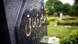 A black gravestone with Arabic writing on it A black gravestone with Arabic writing on it