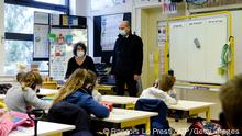 22.03.21 *** French Education Minister Jean-Michel Blanquer visits a classroom in a primary school in La Ferte-Milon, northern France, as part of the deployment of a nationwide Covid-19 saliva test campaign in schools, on March 22, 2021. (Photo by FRANCOIS LO PRESTI / AFP) (Photo by FRANCOIS LO PRESTI/AFP via Getty Images)