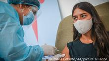 MONTEVIDEO, URUGUAY Äì MARCH 1ST: Valentina is a children's teacher. Teachers, professors and caregivers of children is one of the first essential areas to be vaccinated against Covid-19 in Uruguay.That center expects approximately 400 people to be vaccinated today, in Montevideo on March 1st, 2021.The nationwide immunization campaign against COVID-19 begins today for some 140,000 essential officials from various areas (education, childcare, police, firefighters and active military) with the Sinovac Chinese-origin vaccine.Uruguay is one of the last countries to start vaccination, and began in the early hours of the morning, the vaccination program at the Casa de Galicia hospital, together with more than 90 vaccinations from all over the country, began the immunization campaign against COVID-19, in which it is intended to be a historic day after almost a year of fighting the coronavirus pandemic. Carlos Lebrato / Anadolu Agency