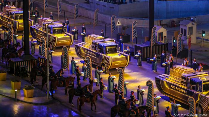 Pharaoh's Golden Parade, procession of vehicles at night