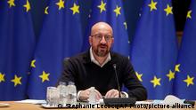 European Council President Charles Michel talks to Cyprus' President Nicos Anastasiades during an online meeting at the European Council headquarters in Brussels, Friday, April 2, 2021. (Stephanie Lecocq, Pool Photo via AP)