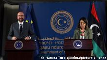 (210404) -- TRIPOLI, April 4, 2021 (Xinhua) -- European Council President Charles Michel (L) and Libyan Foreign Minister Najla al-Mangoush attend a press conference in Tripoli, Libya, on April 4, 2021. (Photo by Hamza Turkia/Xinhua)