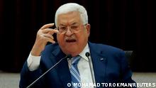FILE PHOTO: President Mahmoud Abbas gestures during a meeting in Ramallah, in the Israeli-occupied West Bank August 18, 2020. REUTERS/Mohamad Torokman/Pool/File Photo