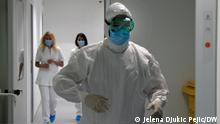 Nis. 05.04.2021. Medical workers put on protective suits and prepare to enter in the covid hospital at the Clinical Center in Nis