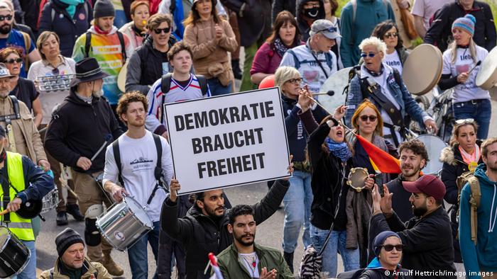 'Querdenker' demonstrators march in Stuttgart
