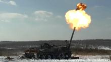 6509330 06.04.2021 In this handout video grab released by Russian Defence Ministry, a tank fires during control checks of combat readiness of the armed forces, in Russia. Russian Defense Minister Sergei Shoigu asked to ensure the high quality of control exercises and safety during the movement of forces and military equipment. Editorial use only, no archive, no commercial use. Russian Defence Ministry