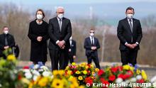 German President Frank-Walter Steinmeier, his wife Elke Buedenbender and Thuringia's State Premier Bodo Ramelow stand at the former concentration camp Buchenwald near Weimar, Germany April 11, 2021, as Germany marks the 76th anniversary of the liberation of the Buchenwald concentration camp by the U.S. army on April 11, 1945. REUTERS/Karina Hessland