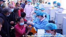 CHONGQING, CHINA - APRIL 12, 2021 - Medical workers vaccinate the masses with the Covid-19 vaccine at the new crown vaccine concentration point in Chongqing, China on April 12, 2021.