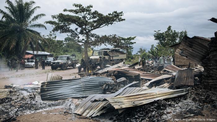 Burnt houses after an ADF attack in the eastern DRC