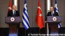Turkish Foreign Minister Mevlut Cavusoglu and his Greek counterpart Nikos Dendias hold a news conference in Ankara, Turkey April 15, 2021. Turkish Foreign Ministry /Handout via REUTERS ATTENTION EDITORS - THIS PICTURE WAS PROVIDED BY A THIRD PARTY. NO RESALES. NO ARCHIVES.