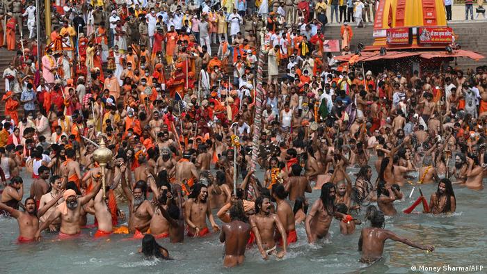 Pilgrims gather closely together for Kumbh Mela festival