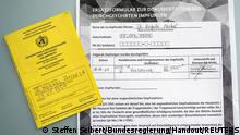 A screenshot from the Twitter account of Government spokesman Steffen Seibert shows vaccination documents for German Chancellor Angela Merkel, who has been vaccinated against the coronavirus disease with AstraZeneca's COVID-19 vaccine, in Berlin, Germany, April 16, 2021. Steffen Seibert/Bundesregierung/Handout via REUTERS THIS IMAGE HAS BEEN SUPPLIED BY A THIRD PARTY. NO RESALES. NO ARCHIVES. PARTS OF THE IMAGE HAVE BEEN PIXELATED AT SOURCE.
