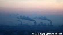 --FILE--Thick smoke rises from a power plant at dusk in Dezhou, east Chinas Shandong province, 4 January 2013. China has unveiled sweeping measures to tackle air pollution, with plans to close old polluting steel mills, cement factories and aluminium smelters, and slash coal consumption and boost the use of nuclear power and natural gas. China has been under heavy pressure to address air pollution after thick and hazardous smog engulfed much of the industrial north, including the capital, Beijing, in January. It has identified coal burning as a key area to tackle. China said its new plan would aim to cut total coal consumption to below 65% of total primary energy use by 2017, down from 66.8% last year. It would also aim to raise the share of non-fossil fuel energy to 13% by 2017, up from 11.4% in 2012. Its previous target stood at 15% by 2020. To help meet the target, it would also raise installed nuclear capacity to 50GW by 2017. By the end of 2015, it said it would add 150bn cubic metres of natural gas trunk pipeline transmission capacity.