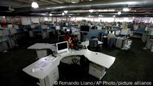 A view of El Nacional's newsroom, Venezuela's last nationally circulated, opposition newspaper, in Caracas, Venezuela, Thursday, Dec. 13, 2018. The newspaper will stop publishing its print edition amid unrelenting government pressure and paper shortages, editors said Thursday. Their final edition will run Friday after 75 years in print. It will become an exclusively online publication. (AP Photo/Fernando Llano)