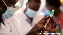 KAMPALA, UGANDA - MARCH 10: A nurse draws a vaccine dose on March 10, 2021 in Kampala, Uganda. Uganda began phase one of COVID-19 vaccinations today after receiving their first batch of 864,000 doses of the AstraZeneca vaccine from the COVID-19 Vaccine Global Access (Covax) facility on Sunday. The first round will primarily vaccinate the most at-risk populations, such as frontline health workers, teachers and the elderly. Uganda has reported 40,490 confirmed COVID-19 cases with 334 deaths as of March 9. (Photo by Luke Dray/Getty Images)