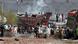 Supporters of TLP block a road and shout slogans in Lahore. Supporters of TLP block a road and shout slogans in Lahore.