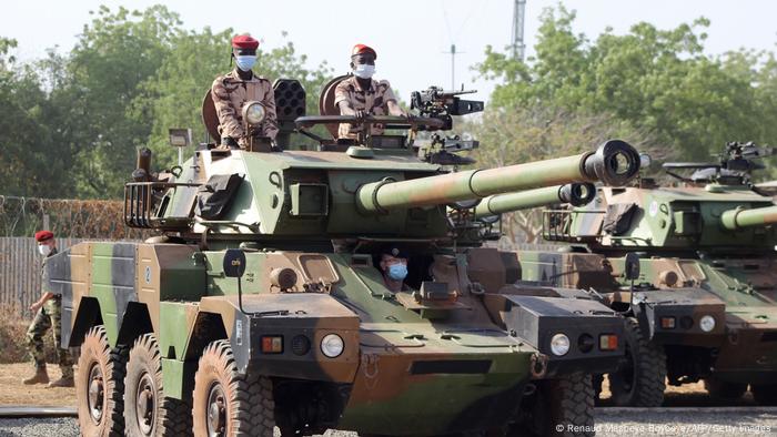 Chadian soldiers in a light armored vehicle