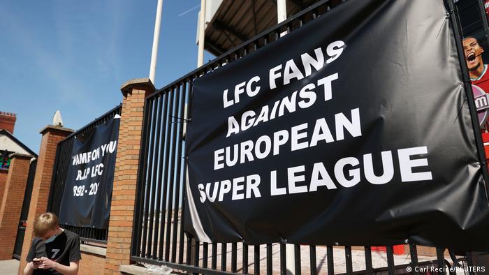 A banner outside Liverpool's Anfield stadium reads: 'LFC fans against European Super League'