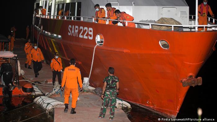 Members of National Search and Rescue Agency (BASARNAS) prepare to search for the missing submarine in Bali, Indonesia.