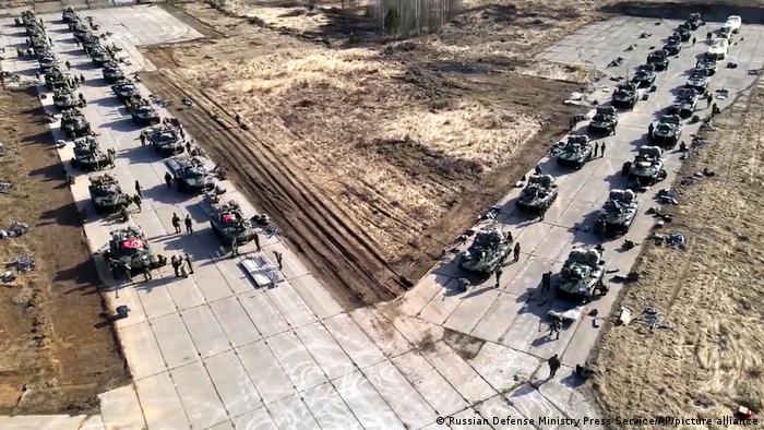 Russian military vehicles move during drills in Crimea