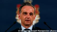 German Foreign Minister Heiko Maas speaks during a press conference after talks with Serbian President Aleksandar Vucic in Belgrade, Serbia, Friday, April 23, 2021. Maas is on a two-day official visit to Serbia. (AP Photo/Darko Vojinovic)