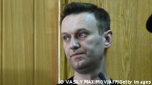 Kremlin critic Alexei Navalny, who was arrested during March 26 anti-corruption rally, attends a hearing at a court in Moscow on March 27, 2017. - A Russian court on March 27 sentenced Kremlin critic Alexei Navalny to 15 days behind bars after ruling that he had resisted police during a massive anti-corruption protest Sunday in Moscow. (Photo by Vasily MAXIMOV / AFP) (Photo by VASILY MAXIMOV/AFP via Getty Images)