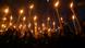 People carry torches as they take part in a march on Friday towards the Tsitsernakaberd Armenian Genocide Memorial Complex commemorating the victims of the Armenian Genocide in the Ottoman Empire. People carry torches as they take part in a march on Friday towards the Tsitsernakaberd Armenian Genocide Memorial Complex commemorating the victims of the Armenian Genocide in the Ottoman Empire.