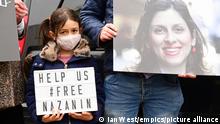Nazanin Zaghari-Ratcliffe detained. Nazanin Zaghari-Ratcliffe's daughter Gabriella at a protest outside the Iranian Embassy in London. Ms Zaghari-Ratcliffe has completed a near five-year sentence in the Islamic Republic over allegations of plotting to overthrow its government - charges which she vehemently denies. Picture date: Monday March 8, 2021. The mother-of-one finished the latter part of her sentence under house arrest and had her ankle tag removed on Sunday - but must still appear before an Iranian court in a week's time. See PA story POLITICS Iran. Photo credit should read: Ian West/PA Wire URN:58498404