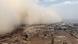 An aerial photograph of sandstorm engulfing a town An aerial photograph of sandstorm engulfing a town