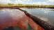 Oil from the Deepwater Horizon oil spill floating on the surface of the water in Bay Jimmy, USA Oil from the Deepwater Horizon oil spill floating on the surface of the water in Bay Jimmy, USA
