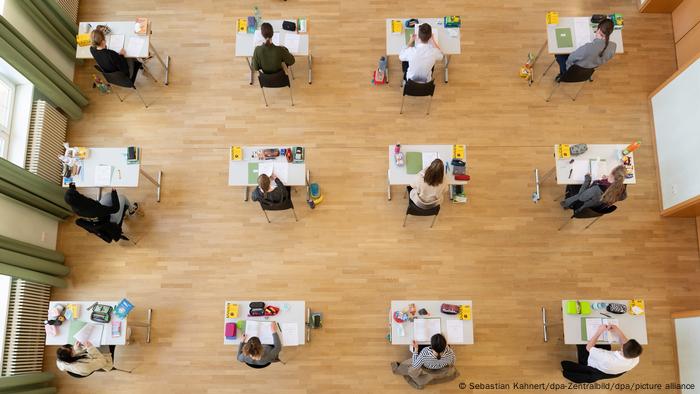 School auditorium with a few tables for the Abitur exam from a bird's eye view